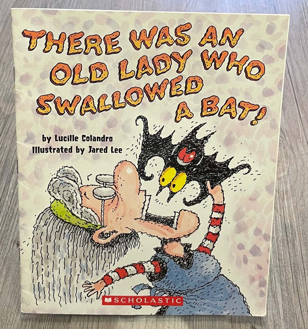 Multi Colour Scholastic There Is An Old Lady Who Swallowed A Bat!, Paperback