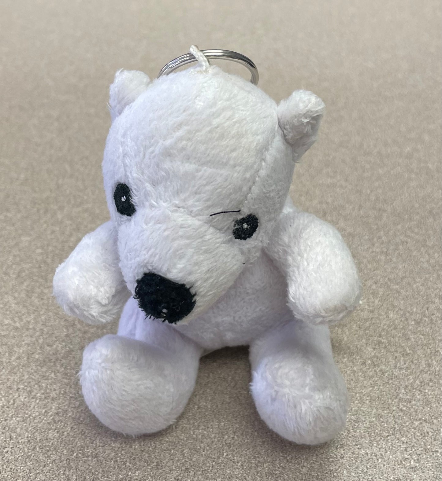 White Key Chain, Pre-owned