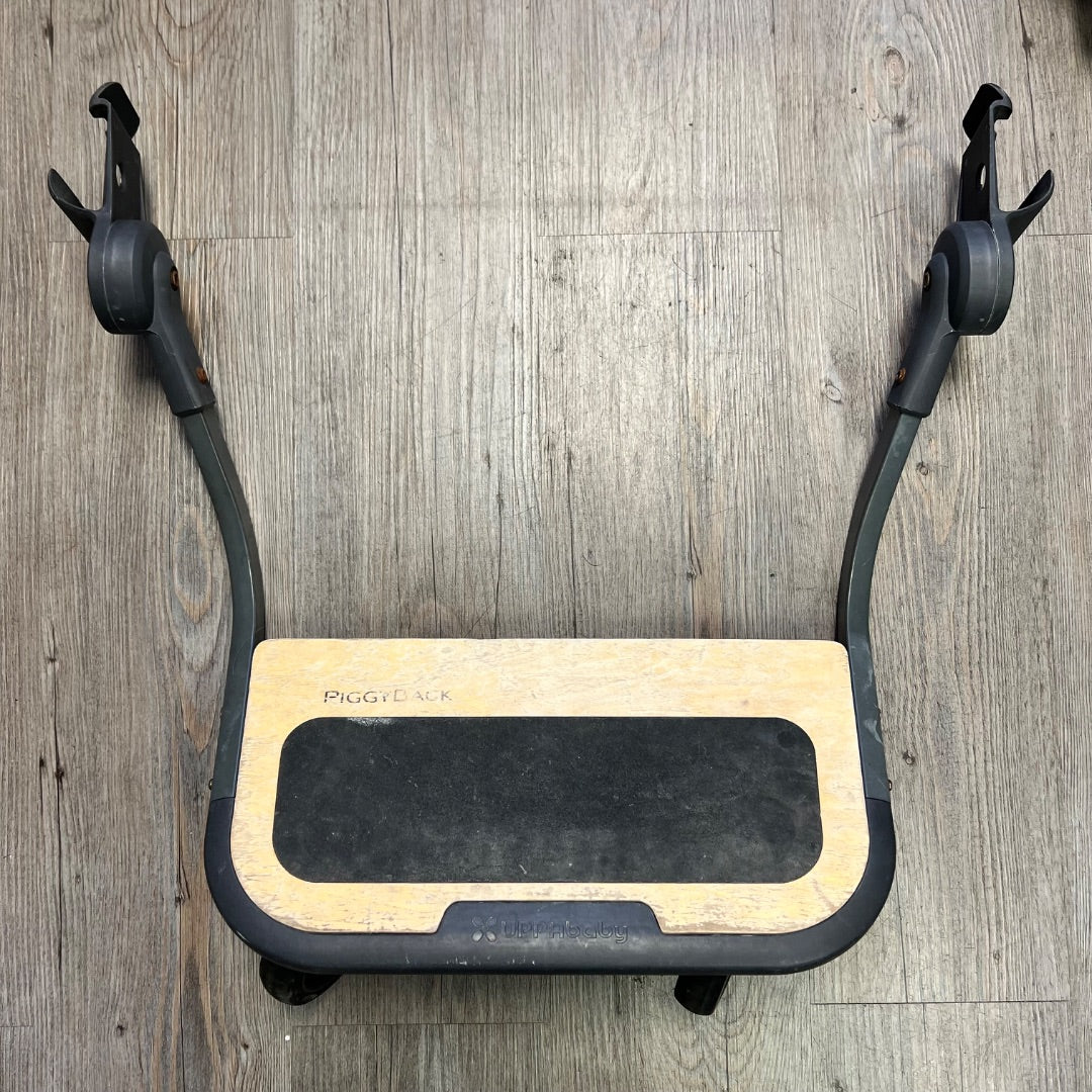 Brown Uppababy Piggy Back, 55 lbs Max