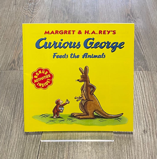 Yellow Curious George Feeds the Animals, Paperback