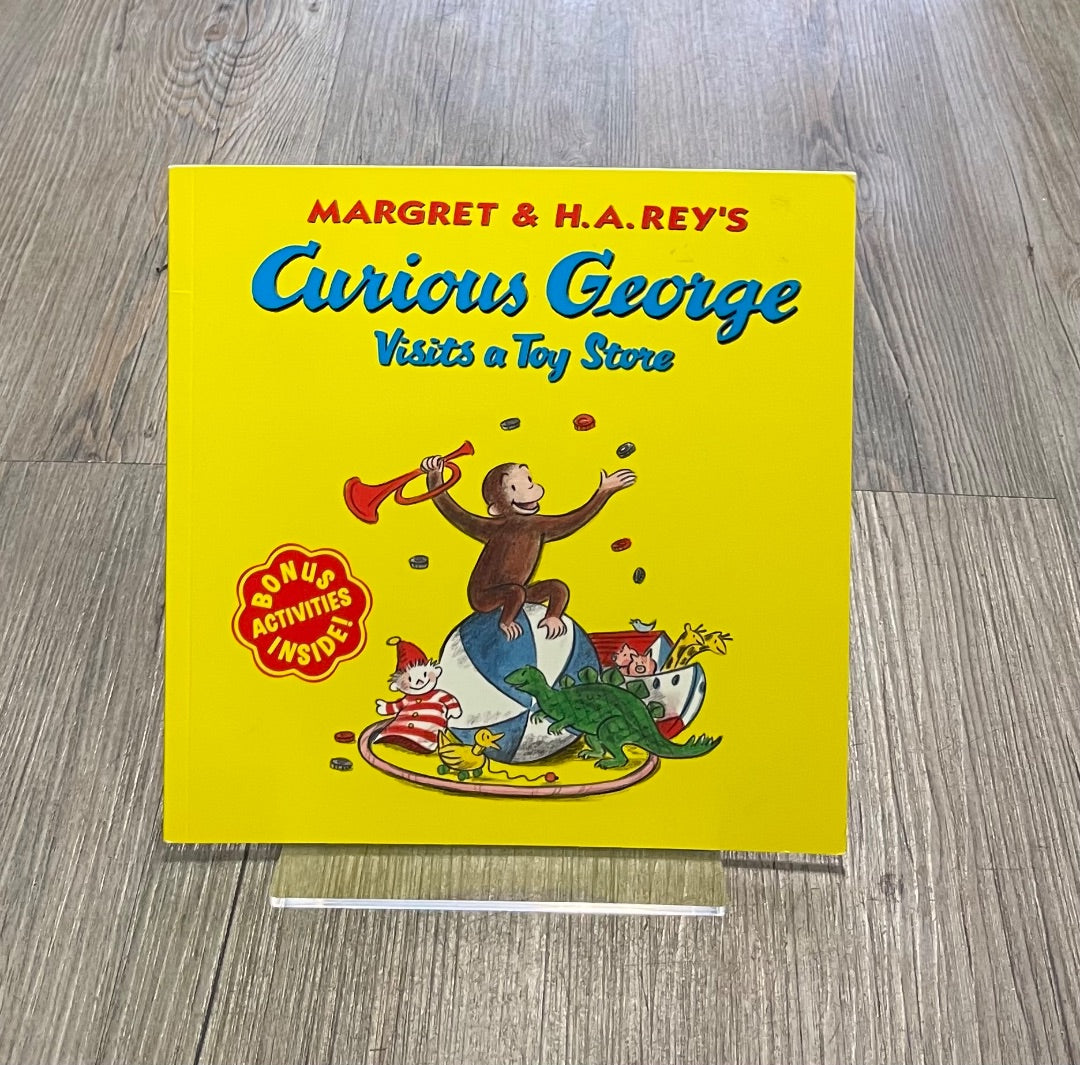 Yellow Curious George Visits a Toy Store, Paperback