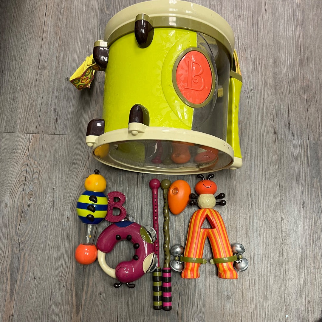 Green B Toys Musical Instruments in a Drum